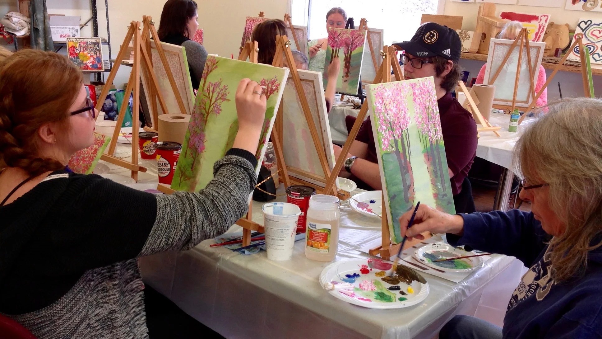 People working together on crafts and activities at a table